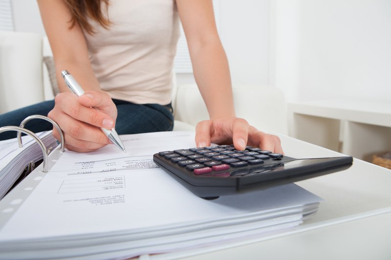 Accountant filling out forms Accountant filling out forms